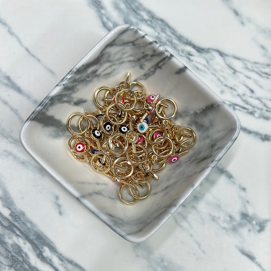 Broche T ojito
