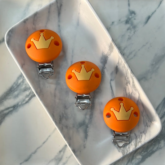 Broche bebé naranja