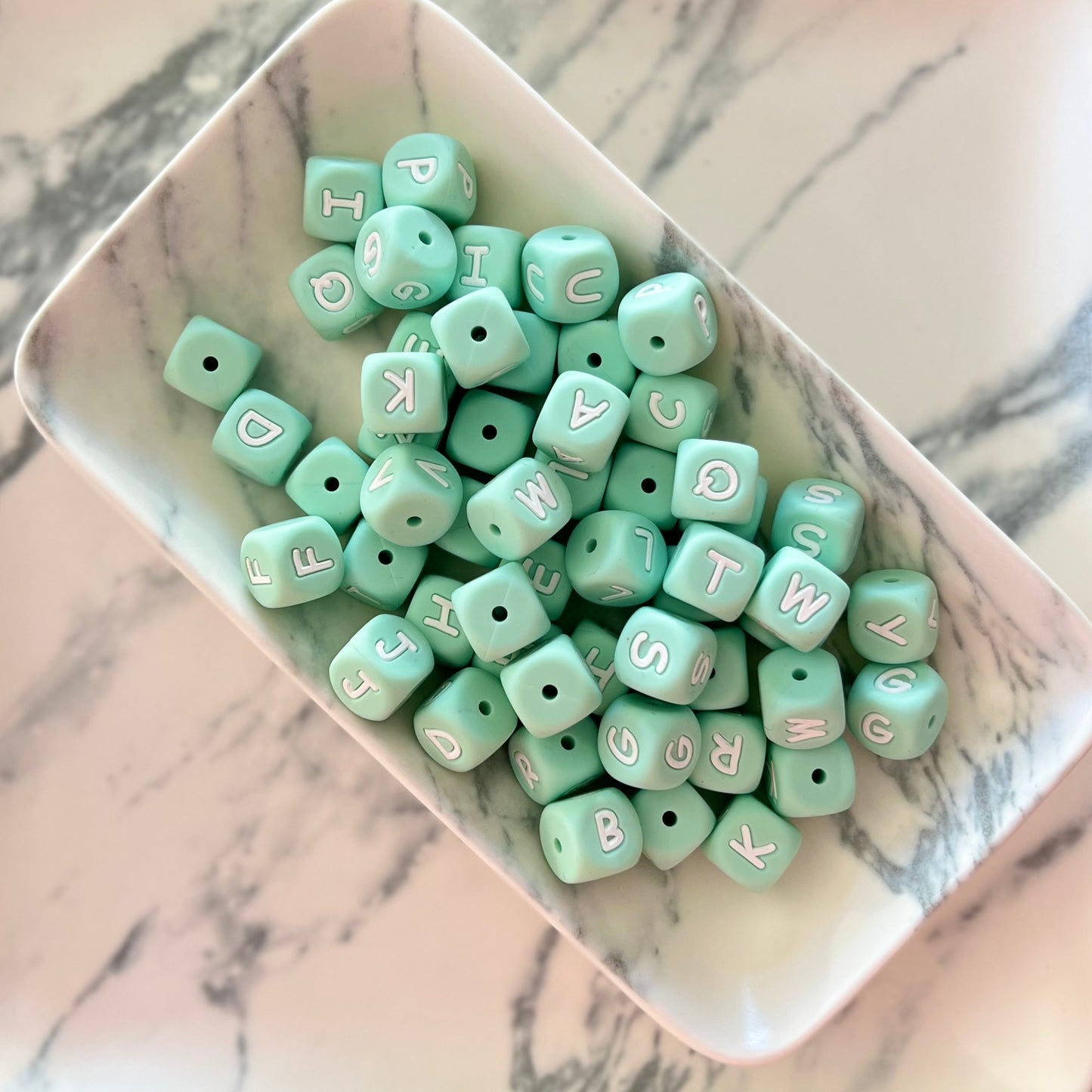 Letra bebé verde